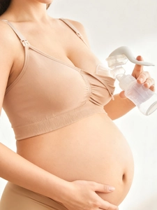 Practical demonstration of seamless nursing bra with manual breast pump in use