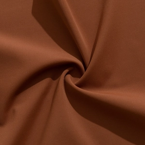 Macro shot of dark brown seamless ice silk fabric texture with smooth twill weave pattern
