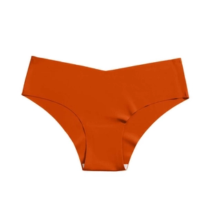 Seamless low-waisted ice silk sports panties for women in vibrant caramel orange color