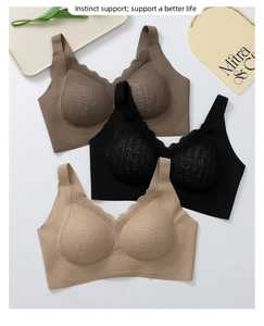 Dettagli di reggiseni in pizzo senza cuciture in tre colori con spalline larghe