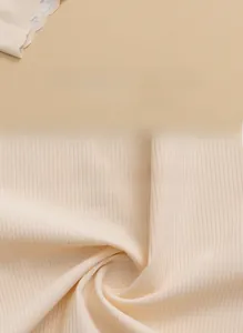 Macro detail of breathable beige ice silk fabric and wave-cut seamless edges on panties