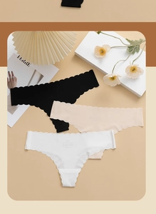 Detailed view of seamless ice silk thongs with wavy edges in a 3-pack set