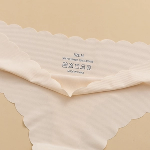 Seamless ice silk panties in beige with ribbed texture and scalloped edges for women