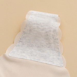 Seamless ice silk panties for women featuring a wavy edge and ribbed texture in beige