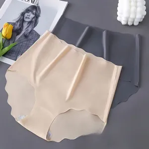 Detail of seamless high-waist panties in beige and grey with scalloped wavy edge design