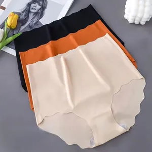 Close-up of three seamless high-waist ice silk panties with smooth raw edges and cotton crotch