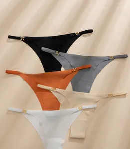 Detail of five seamless thongs with side metal rings and thin straps in ice silk