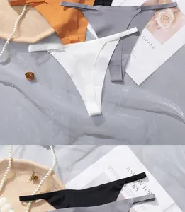 Close-up of seamless ice silk thongs with fine straps and cotton crotch in various colors