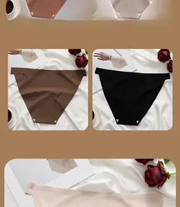 Detail of seamless ribbed thong underwear in various earth tones and soft textures