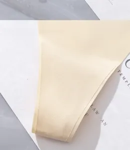 Detail of double-layer cotton crotch and seamless stitching on pale yellow ice silk panties