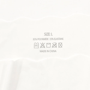 Close-up of seamless ice silk underwear showing size L and fabric composition label