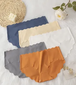Five-pack seamless ice silk panties with wave edges in mixed colors on a plush background
