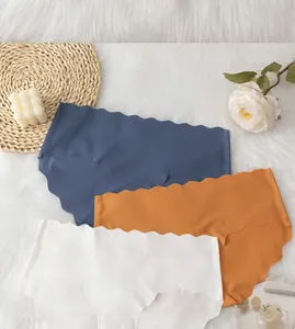 Detailed view of seamless ice silk panties with wave-cut edges in soft colors