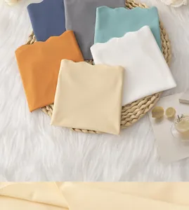 Detail of seamless ice silk panties with wavy edges and various pastel colors on a tray