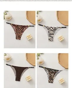 Detail view of four animal print seamless G-strings with metal ring and branded waistbands