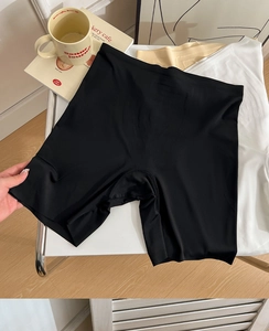 Detail of high waist seamless safety shorts in black, beige and white color options