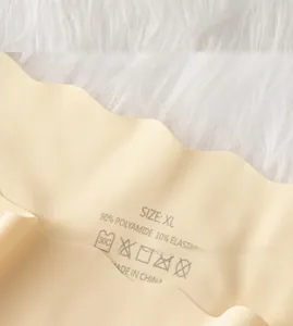 Detail of XL seamless ice silk panties showing material composition and scalloped edge