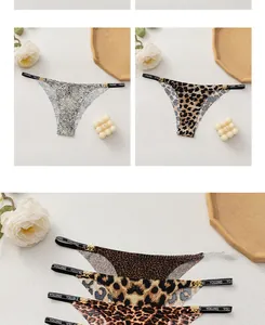 Detail of leopard print thong with elastic waistband and golden metal ring accents