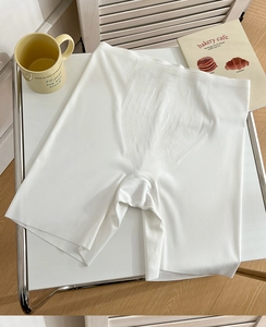 Close-up of seamless high-waist white safety shorts with ultra-elastic silky fabric