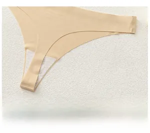 Detail of seamless beige thong showing soft stretch fabric and breathable cotton lining
