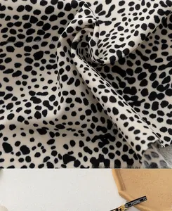 Macro shot of seamless polka dot fabric with soft knit texture and breathable cotton lining