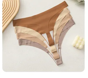 Detail view of seamless low-waist thongs in earth tones with smooth laser-cut edges