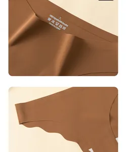 Detail of laser-cut wavy edges and heat-pressed size label on brown seamless panties