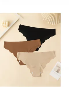 Close-up of three seamless ice silk panties with wavy edges in black, coffee, and beige