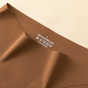 Seamless low-waist ice silk underwear for women in caramel brown with soft fabric texture
