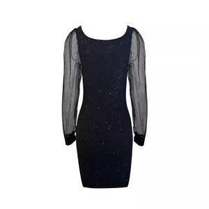 Elegant black V-neck dress with sheer mesh puff sleeves and silver glitter starry pattern