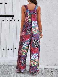 Detailed back view of sleeveless jumpsuit featuring bohemian floral and paisley patterns