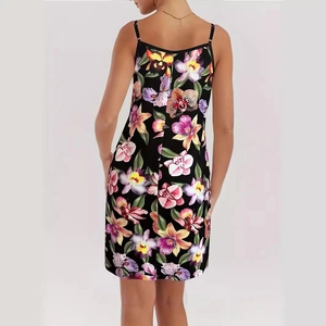 Back view of a plus-size black floral sundress with vibrant orchid print and adjustable straps