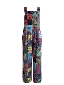 Detail of bohemian patchwork jumpsuit showing paisley prints and wide leg design