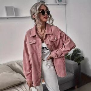 Pink corduroy button-up shirt jacket with chest pockets and loose long sleeves for women