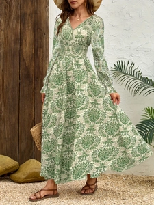 Bohemian V-neck maxi dress with vintage floral print and elastic waist in green and white