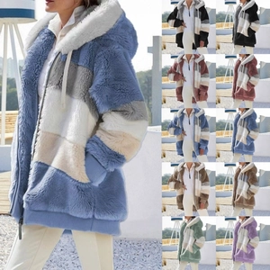 Detail view of multi-color patchwork faux fur hoodie with zipper closure and side pockets