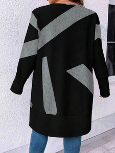 Detailed back view of long sleeve casual top with black and grey geometric stripe patterns