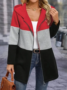 Detail of red, grey, and black color block hooded jacket with round zip puller