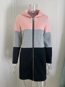 Detail of three-color stitching hoodie with pink grey and black panels and ring zipper
