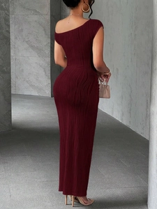 Macro detail of wine red bodycon maxi dress with unique 3D water ripple textured fabric