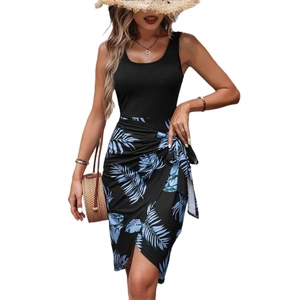 Sleeveless maxi dress with black bodice and tropical blue palm leaf print wrap skirt
