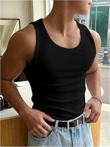 Detailed view of the ribbed fabric texture on this slim-fit black men's tank top