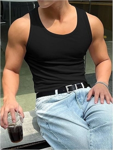 Detail of men's black ribbed knit tank top paired with light blue jeans in sunlight