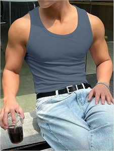 Detail of navy blue ribbed cotton gym tank top showing texture and slim fit design