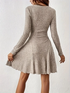 Rear view of long-sleeve A-line knit dress in light grey ribbed fabric for women