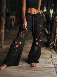 Casual zwarte wijde broek voor dames met kleurrijk bloemenborduursel en trekkoord in de taille