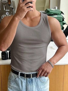 Close-up of men's grey ribbed tank top showing high-quality elastic fabric and slim fit design