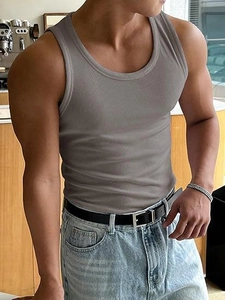 Detailed close-up of gray ribbed texture fabric on a slim-fit men's fitness tank top