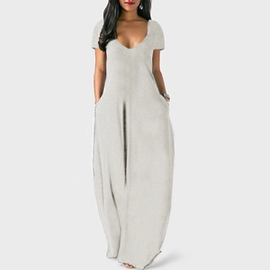 Detail view of the deep V-neckline and functional pockets on this light gray maxi dress