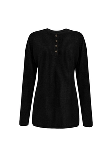 Detail of black rib-knit henley shirt with long sleeves and brown buttons on white background